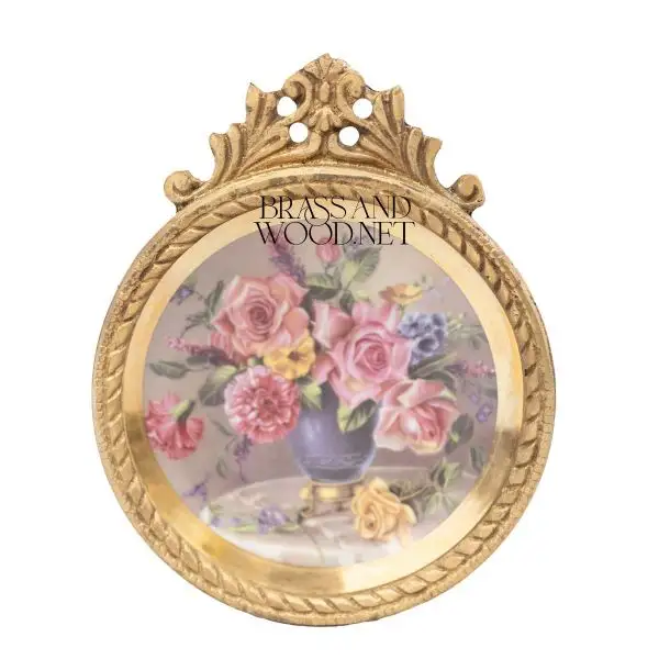 antique brass decorative round frame with porcelain painting of floral bouquet in blue vase vintage aged artwork luxury