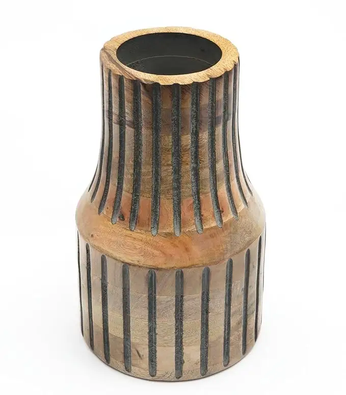 Natural wood vase featuring cylindrical form carved linear detailing and earthy handcrafted character for interiors home decor